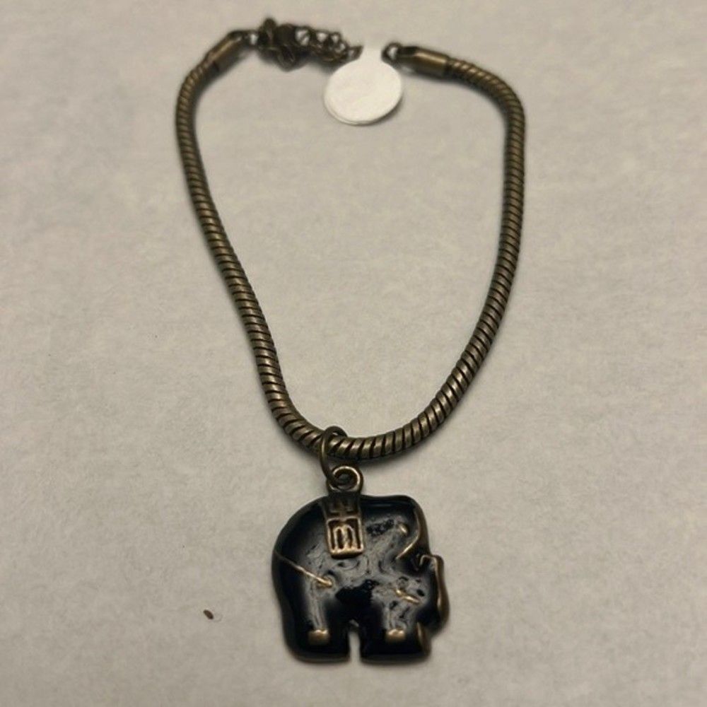 Handcrafted antique gold tone black elephant bracelet with built in extender